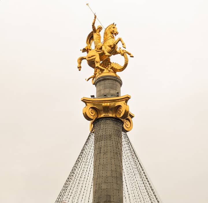 Golden statue of Saint George on Freedom Square, Tbilisi, Georgia.