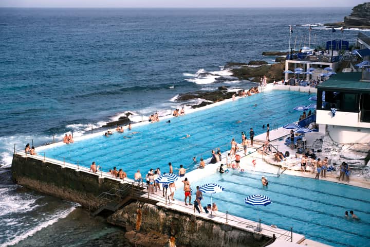 Explore the iconic Bondi Beach Icebergs Club with oceanfront swimming pools, perfect for leisure and travel.