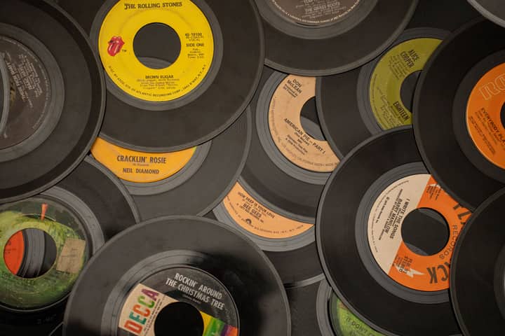 A collection of vintage vinyl records showcasing iconic music labels and artists.
