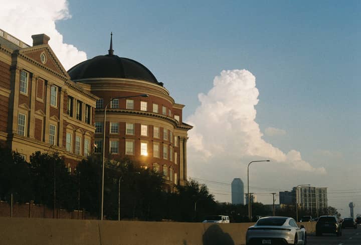 View of a historic dome building in Dallas, Texas, featuring urban architecture.