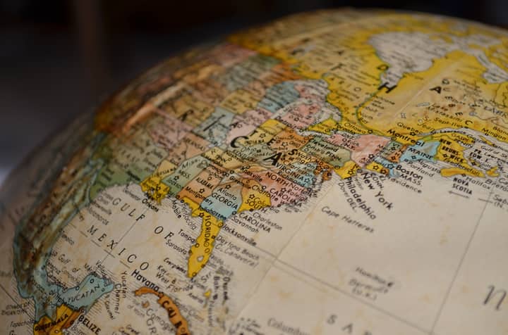 High-resolution close-up of North America on a vintage globe, showcasing detailed geographical features.