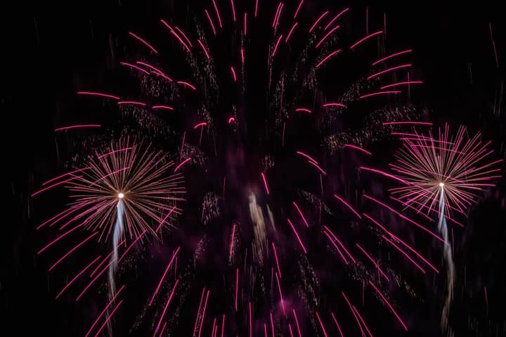 A spectacular fireworks display with vibrant colors lighting up the night sky.