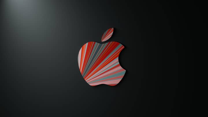 Colorful striped pattern on an apple-shaped design on a dark background, artistic and modern.