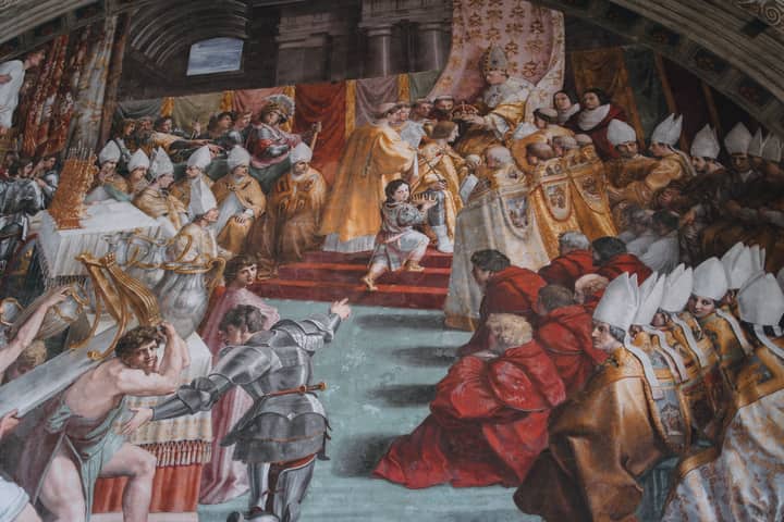 Historic Renaissance fresco showcasing a ceremonial scene in Vatican City.