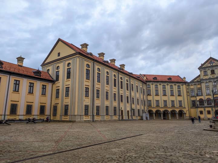 Historic Nesvizh Castle courtyard with architectural beauty in Belarus.
