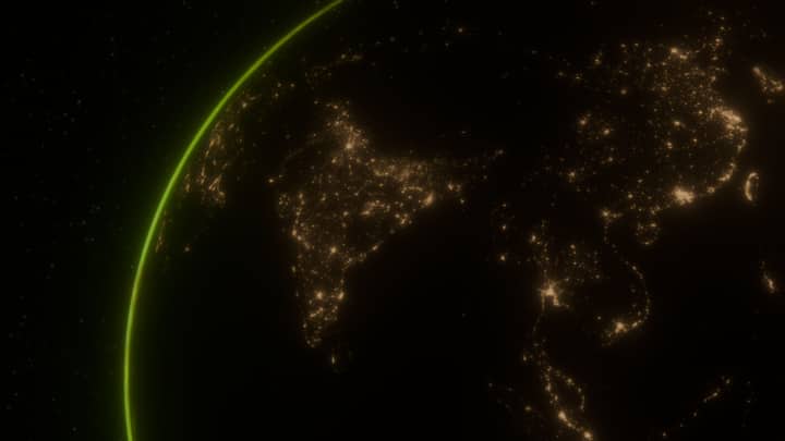 Stunning night view of Earth's Asia continent with city lights from space.
