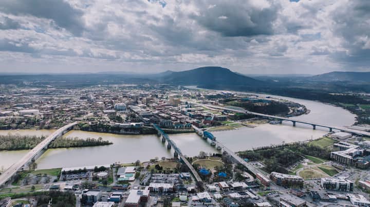 Aerial shot of Chattanooga, Tennessee, showcasing the city skyline and Tennessee River.