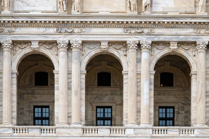 Close-up of the ornate archways and columns at the Minnesota State Capitol building.