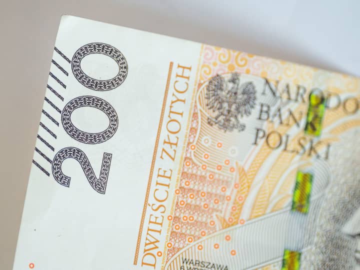 Detailed close-up image of a 200 Polish Zloty banknote showing intricate design and security features.