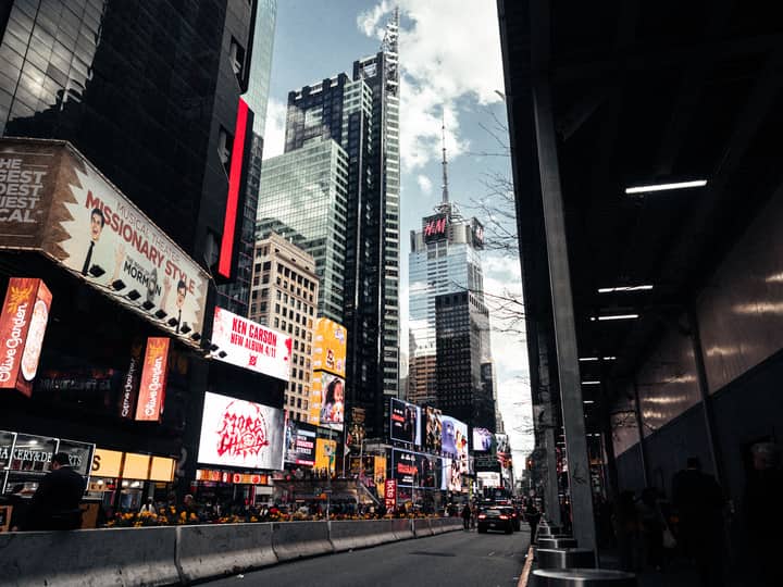 Vibrant view of Times Square's bustling city life, showcasing skyscrapers and billboards in New York City.