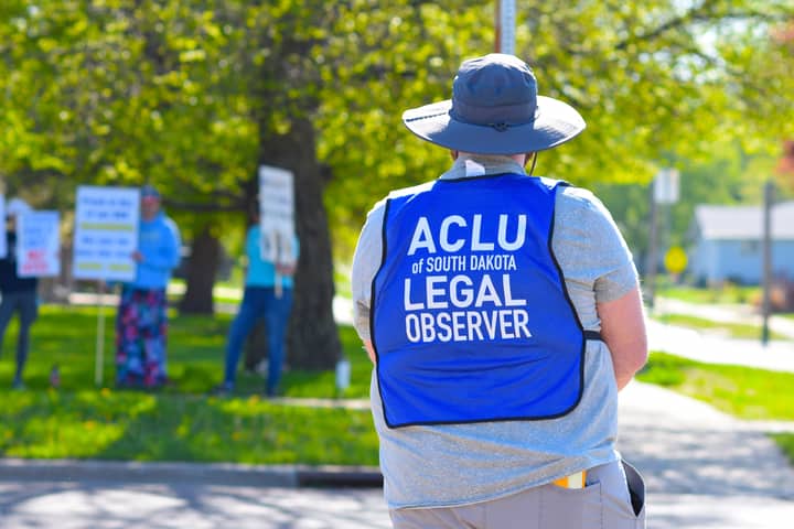 Legal observer at a South Dakota protest, ensuring rights protection during public demonstration.