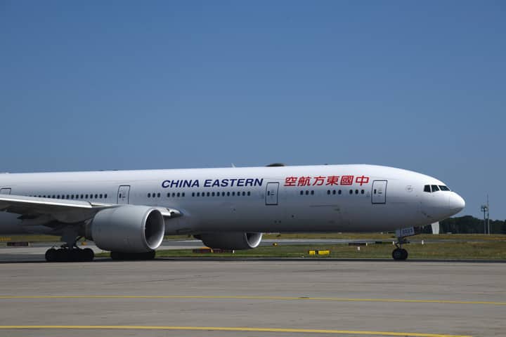 China Eastern Boeing 777 on the runway at Frankfurt Airport, Germany.