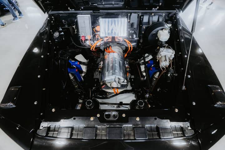 Top view of a modern electric car engine showcasing technical components and design.