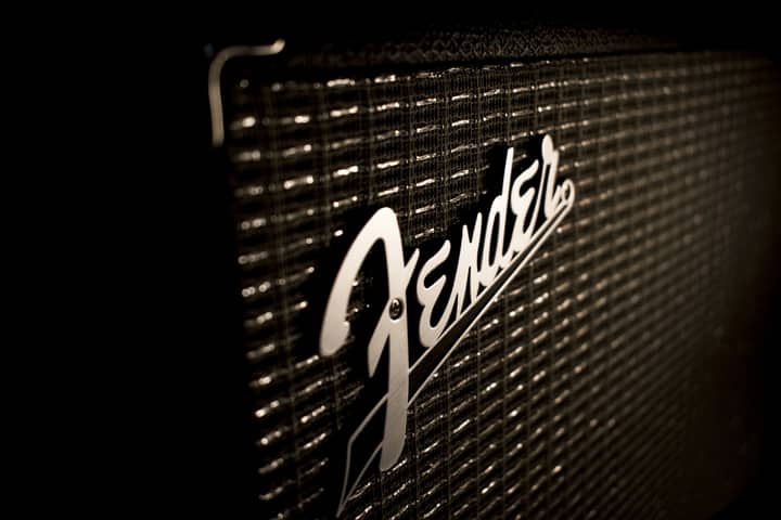 Artistic close-up of a vintage amplifier grill with textured design, showcasing classic music appeal.