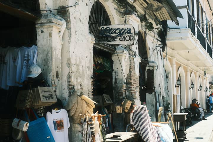 A vintage antique shop in a historic, sunny street setting. Charming and nostalgic.