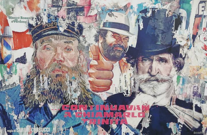 A vibrant vintage-style movie poster with iconic film characters on a worn wall in Turin, Italy.