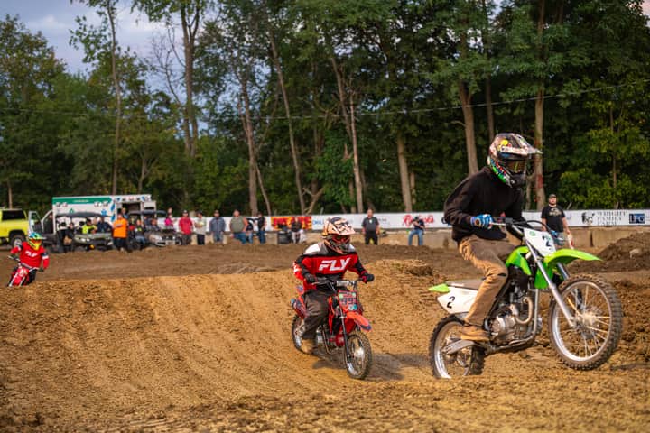 Exciting dirt bike race captured on a challenging track with riders in action.