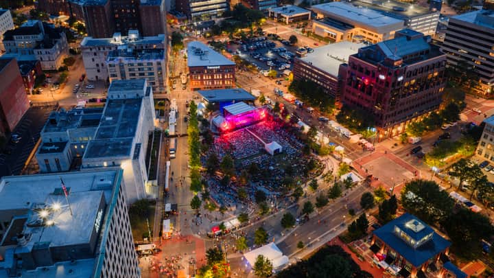 Drone shot capturing a vibrant night festival in downtown Chattanooga, Tennessee.