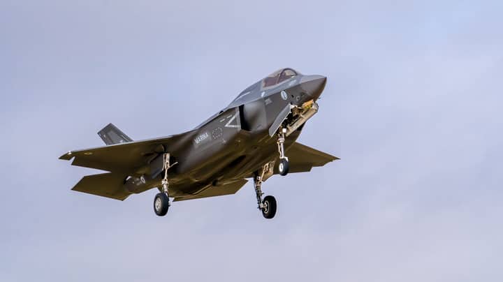 A powerful F-35 fighter jet soars above Los Llanos in Spain, showcasing modern military aviation.
