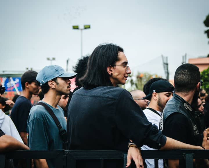 Energetic crowd enjoying an outdoor festival in Casablanca, Morocco, capturing diverse cultural expressions.