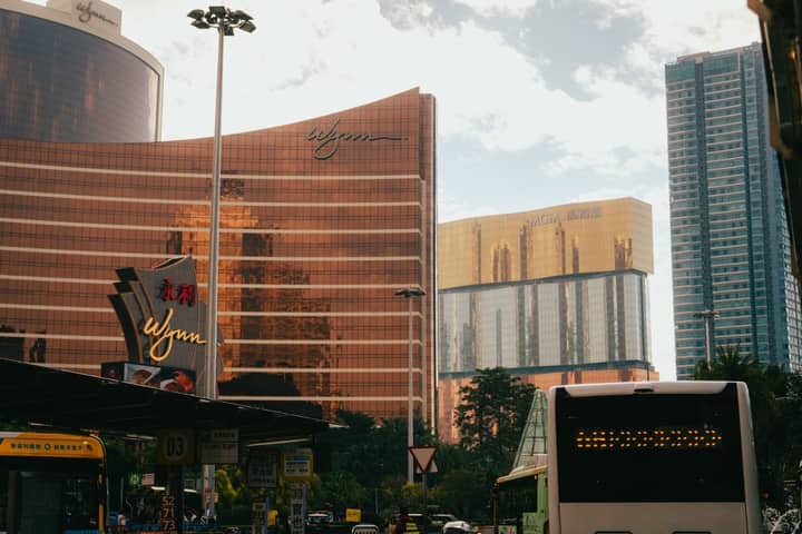Captivating urban scene featuring Wynn and MGM buildings under a beautiful sky in Macau.
