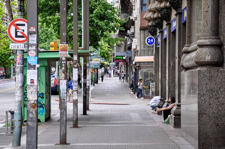Street view of Montevideo capturing urban life with people and architecture.