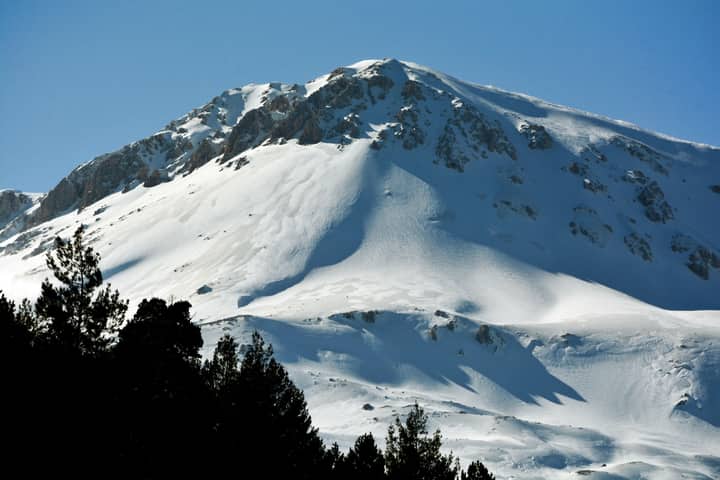 Stunning winter view of the Gömbe mountain summit covered in snow in Antalya, Türkiye.