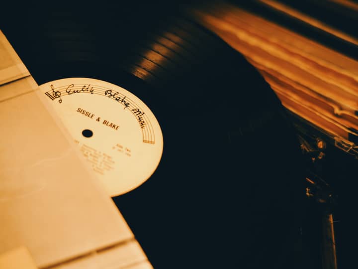 Close-up of a vintage vinyl record featuring "Sissle & Blake," evoking nostalgia and classic music vibes.