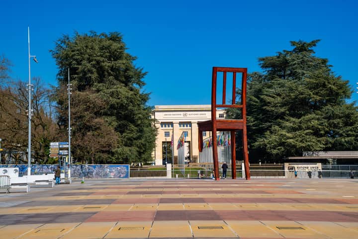 Iconic Broken Chair sculpture near UN building in Geneva.