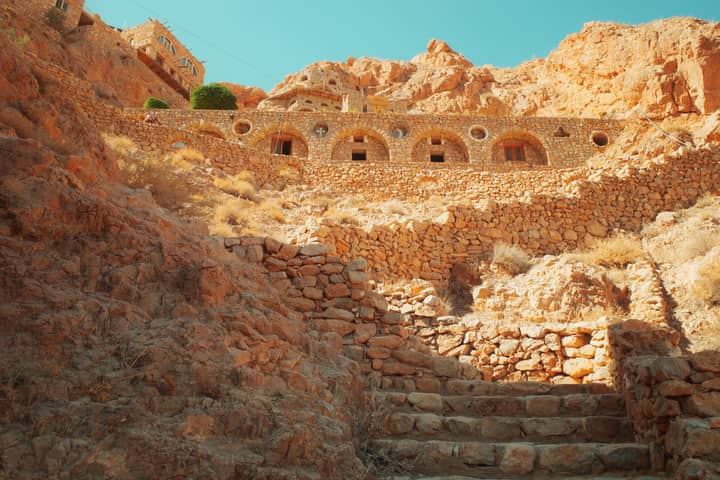 Ancient stone building facade in Al Nabk, Syria, showcasing unique architectural heritage.