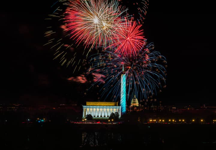 Spectacular fireworks over Lincoln Memorial and Washington Monument in Washington, DC.