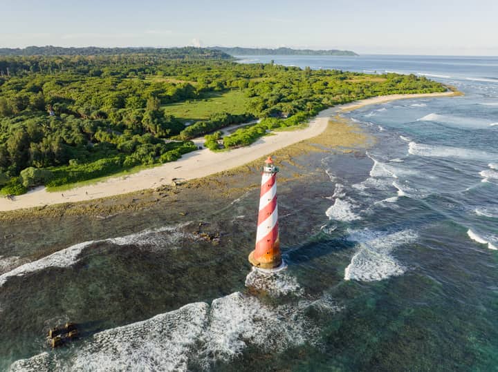 Stunning aerial view of Indira Point Lighthouse on Great Nicobar Island, India.