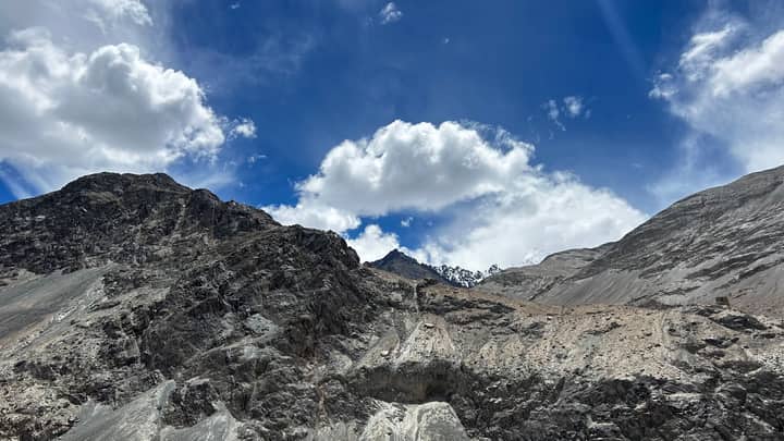 A captivating view of rugged mountains under a clear blue sky in Ladakh, India.
