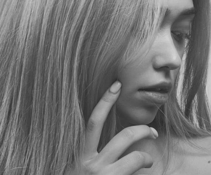 Elegant monochrome portrait capturing a young woman in Kyiv, Ukraine.