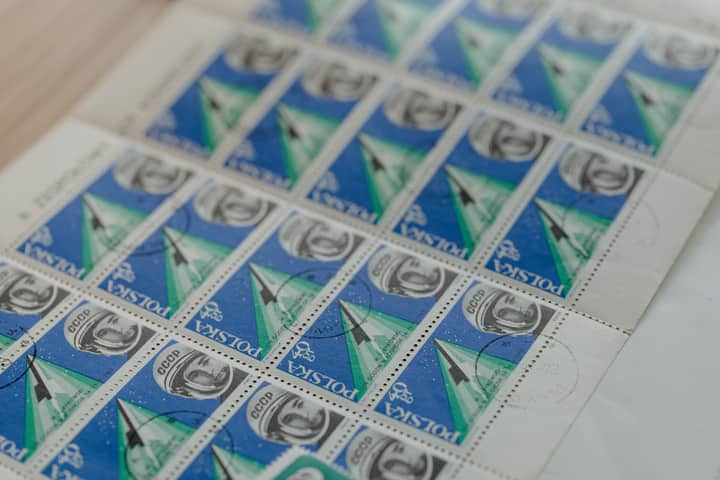 Close-up of collectible Polish postage stamps depicting space exploration themes.