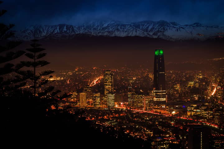 Beautiful night view of Santiago's skyline with the Andes mountains in the background.