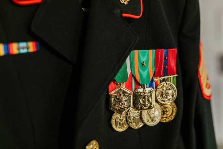 Close-up of a military uniform with vibrant medals representing honor and recognition.