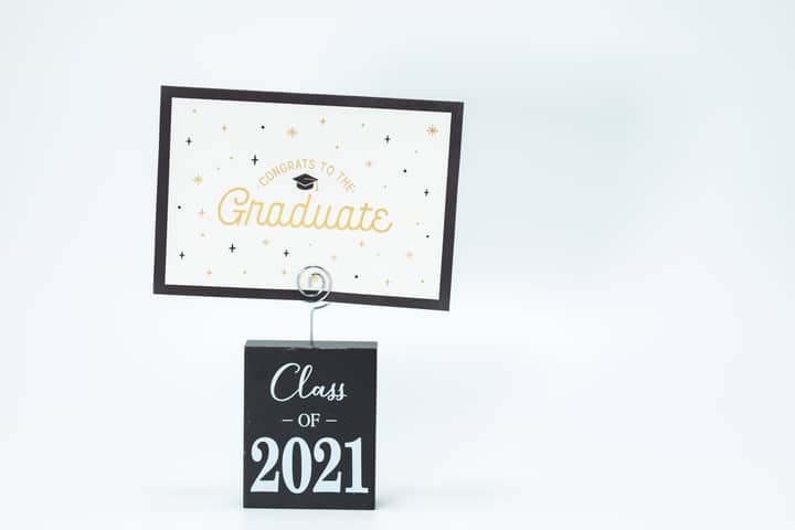 Elegant graduation card display for the Class of 2021 with greeting message.