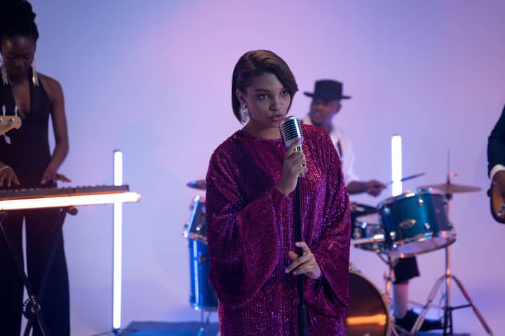 A vibrant performance by a female-led band showcasing their musical talents.