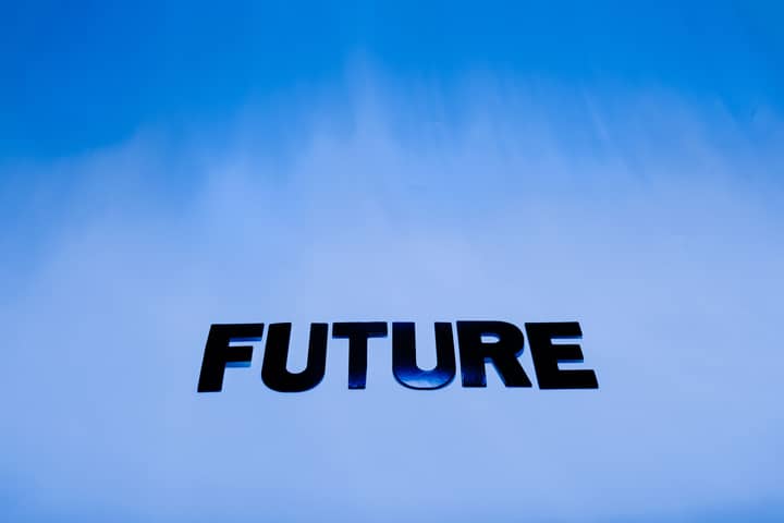 The word 'Future' in bold letters against a bright blue abstract background.