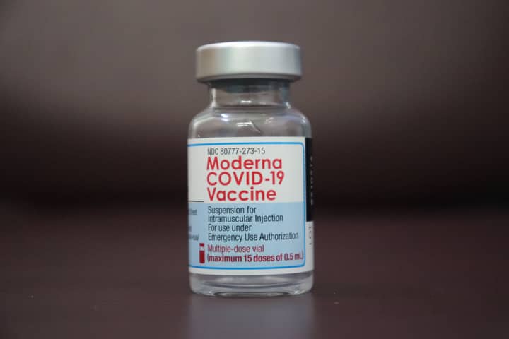 Close-up of a Moderna COVID-19 vaccine vial for emergency use authorization.