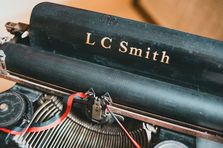 Close-up of an antique LC Smith typewriter showcasing detailed craftsmanship.