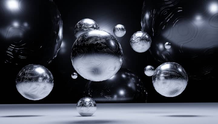 An abstract 3D visualization of floating silver balls with complex textures and shadows.