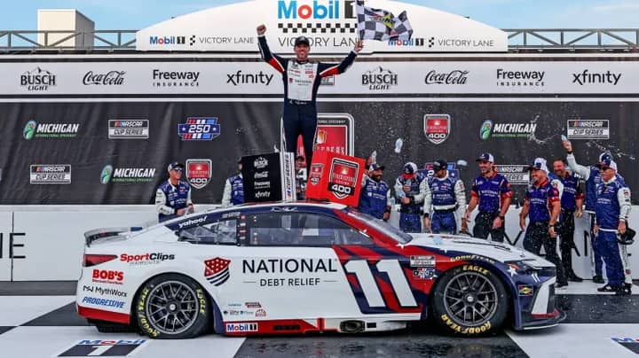 Denny Hamlin pays tribute to Kyle Busch at Michigan after tying late driver's Cup Series wins