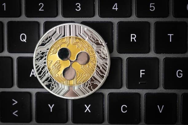 XRP Compression Peaks: Symmetrical Triangle Signals Explosive Move Ahead