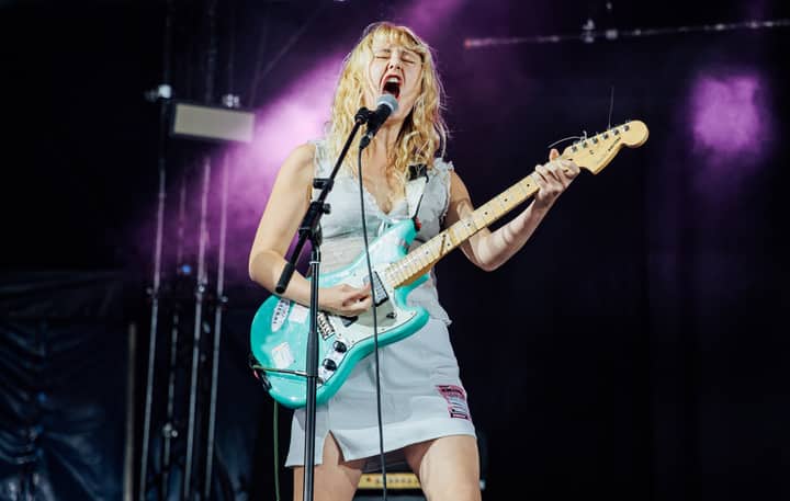 Lambrini Girls reschedule North American tour and pull out of Coachella after Phoebe Lunny reveals neck fracture and “acute brain injury”