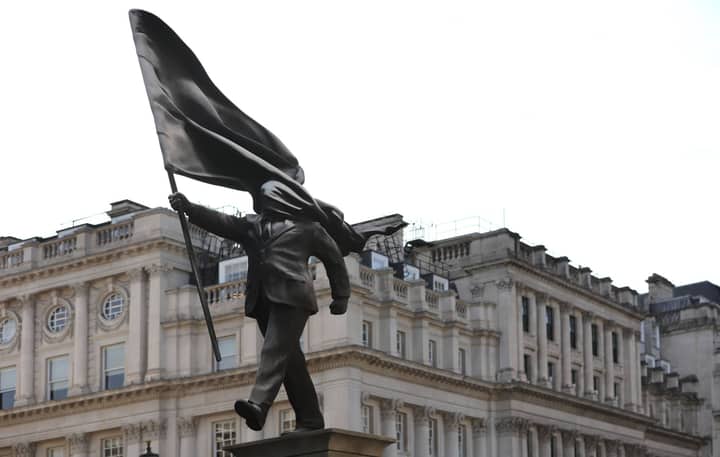 Banksy claims responsibility for new London statue of man blinded by flag