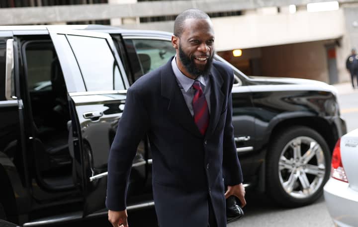 Fugees rapper Pras Michel vows to appeal conviction as he turns himself in to begin 14-year prison sentence