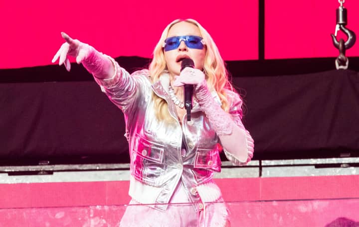 Madonna urges fans to “put your fucking phones down and connect” after returning to the stage