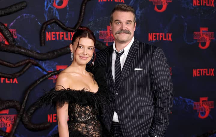 David Harbour says he and Millie Bobby Brown “still adore each other” after harassment allegations as they both speak out